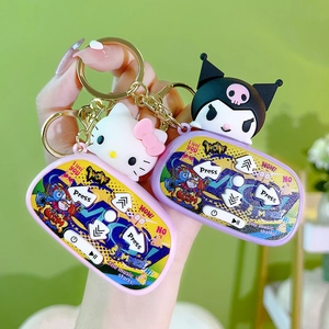 Mini handheld cartoon game console keychain with Hello Kitty and Kuromi designs