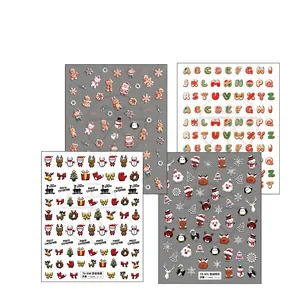 Set of four 5D embossed Christmas nail stickers featuring Santa, reindeer and snowflakes
