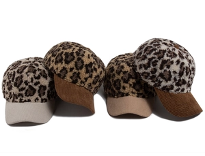 Detail of leopard print faux shearling and corduroy visor on colorful baseball caps