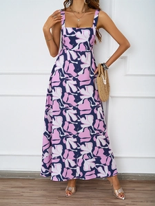 Detail view of summer floral maxi dress with sleeveless straps and tropical flower print