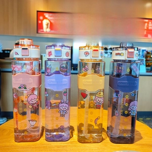 Detailed view of 900ml square plastic water bottles with scales and carrying ropes