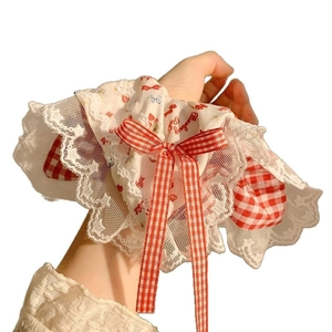 French style oversized scrunchie with red strawberry patterns and lace trim detail