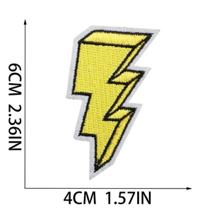 Close-up of lightning bolt embroidery patch with dimensions 6cm x 4cm on white background