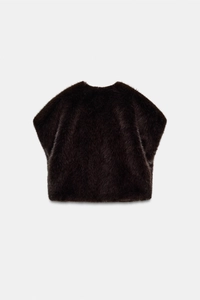 Back view of a short faux fur vest in deep coffee brown with soft plush texture