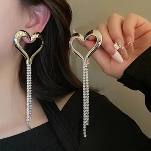 Elegant silver heart earrings with long crystal tassel fringe for a glamorous look