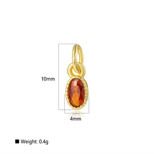 Détail d'un pendentif doré 10x4mm avec zircon orange, incluant dimensions et poids