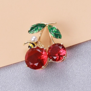 Elegant gold cherry brooch with red stones, green leaves, white pearl and honeybee