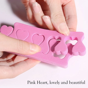 Pink heart-shaped EVA foam toe separators for nail art and professional pedicure care
