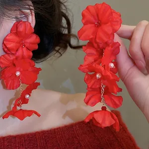 Elegant red fabric flower drop earrings with pearls and vintage floral design