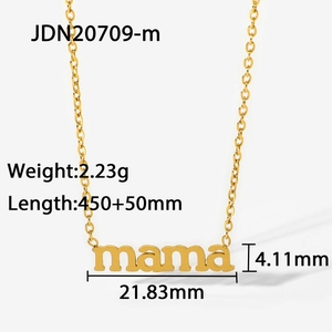 Macro shot of 18K gold plated stainless steel mama pendant necklace with measurements