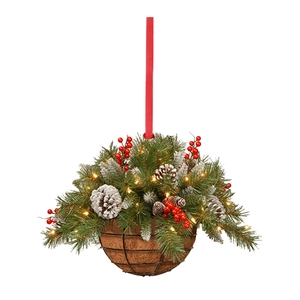 Detail of Christmas hanging basket with LED lights, red berries, and natural pine cones