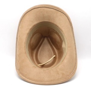 Detail view of the suede cowboy hat interior with adjustable sweatband and fine stitching