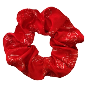 Red satin Christmas hair scrunchie with white Christmas tree print on white background