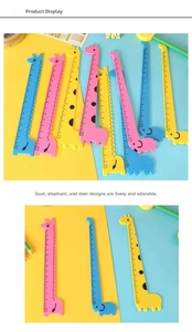 Close-up of 15cm cartoon giraffe and elephant plastic rulers for students
