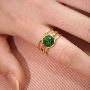 Three-piece set of 14k gold plated stainless steel rings with green natural stone and hammered finish