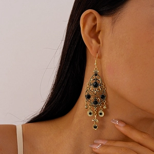 Vintage gold drop earrings with black rhinestones and hollow floral patterns for women