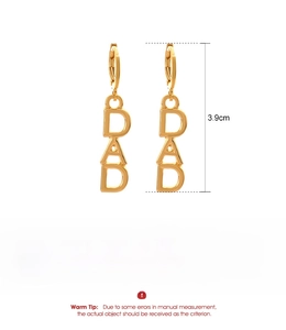 Detail showing golden DAD letter earrings with dimensions 3.9cm and alloy material info