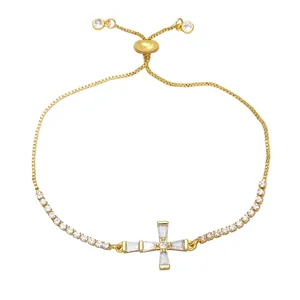 Gold box chain cross bracelet with white cubic zirconia and adjustable slide clasp