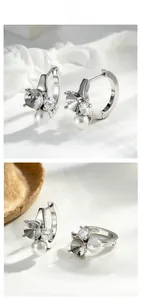 Detail view of silver earring components with 6mm zircon and pearl for DIY jewelry