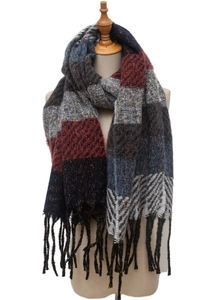 Macro shot of striped knit scarf texture with fringe detail in navy and burgundy colors