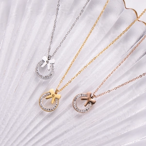 Three-color bowknot circle pendant necklaces with zircon inlay on wave texture base
