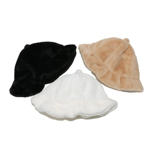 Detailed plush bucket hats in black, white and camel with wavy ruffled edges for women