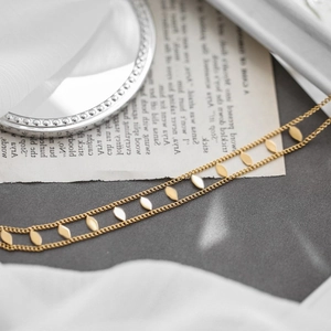 Double-layered 18K gold plated titanium steel oval link necklace with leaf charms