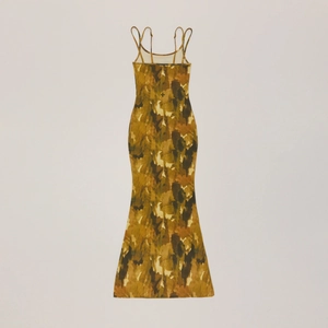 Macro detail of camouflage print fabric on slim fit midi dress with adjustable straps
