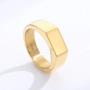 Detailed close-up of 316L stainless steel engraving on gold men rectangle ring