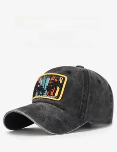 Detail of vintage washed charcoal baseball cap with tropical palm tree embroidery patch
