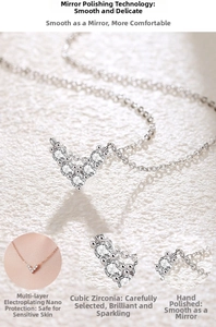 Detailed view of V-shaped zircon pendant necklace with silver and rose gold mirror plating