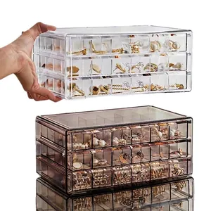 Three-layer clear acrylic jewelry box with drawer dividers for rings and earrings