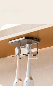 Detail showing magnetic toothbrush holder with 10-degree tilt and deep card slot design