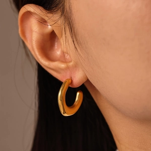 Minimalist C-shape irregular hoop earrings with polished 18k gold plating finish