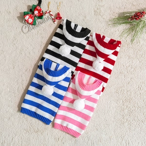 Striped knit pet hoodies in four colors with pom-poms for dogs on festive background