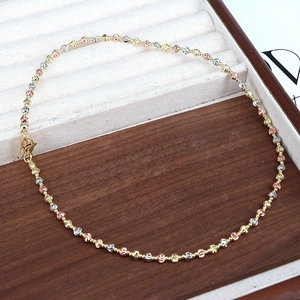 Three-tone striped geometric beads necklace in gold, silver, and rose gold with lobster clasp