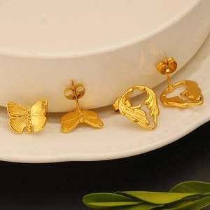 Elegant 18K gold butterfly and heart wing stud earrings made of stainless steel