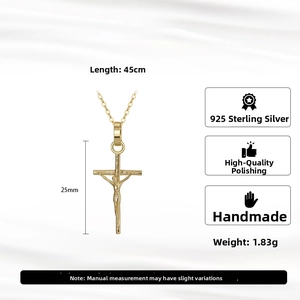 Detail of 925 sterling silver 14K gold cross necklace showing 25mm pendant and 45cm chain