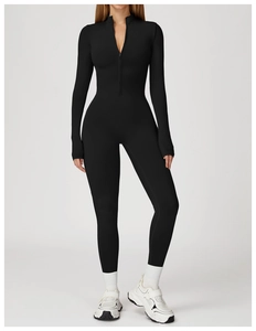 Close-up of black thermal long sleeve jumpsuit with half-zip stand collar for yoga