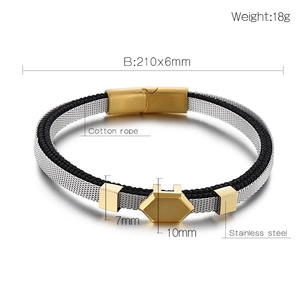 Vue détaillée d'un bracelet en coton tissé avec fermoir magnétique en acier doré