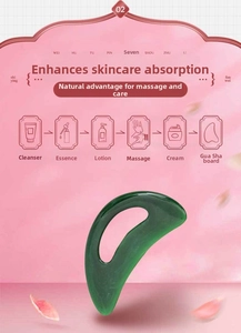 Detail view of green resin massage tool with ergonomic grip hole for face and neck