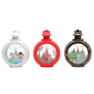 Three Christmas LED lanterns featuring snowman, Santa, and tree in white, red, and bronze