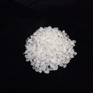 Macro shot of natural white quartz crystals on a black background for aquarium decor