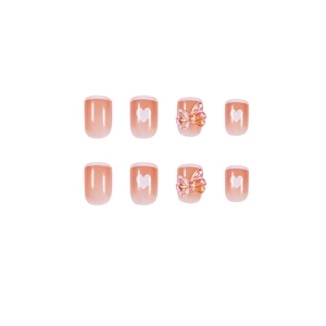 French tip nude press-on nails with white hearts and 3D laser glitter butterfly charms