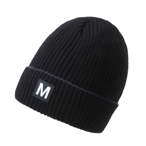 Thick black ribbed knit beanie with a white 'M' patch, perfect for winter warmth