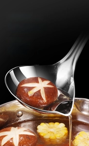 Macro detail of 304 stainless steel oil separator ladle with bottom soup spout