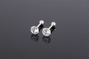 Detailed macro view of S925 silver stud earrings with screw back and clear cubic zirconia