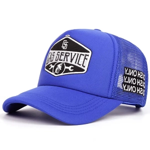 Detail of royal blue trucker hat with GAS SERVICE embroidery and breathable mesh