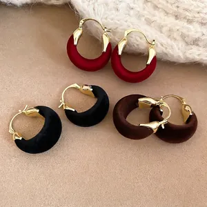 Vintage flocked hoop earrings in red black and brown with gold metallic buckle