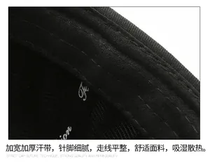 Detail view of the wide thickened sweatband and fine stitching inside the black docker cap